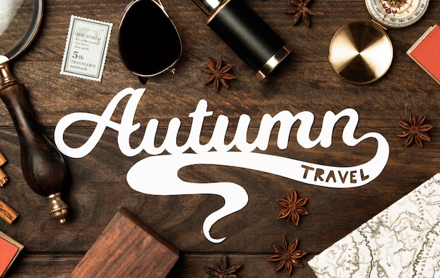 Top view autumn travel concept lettering