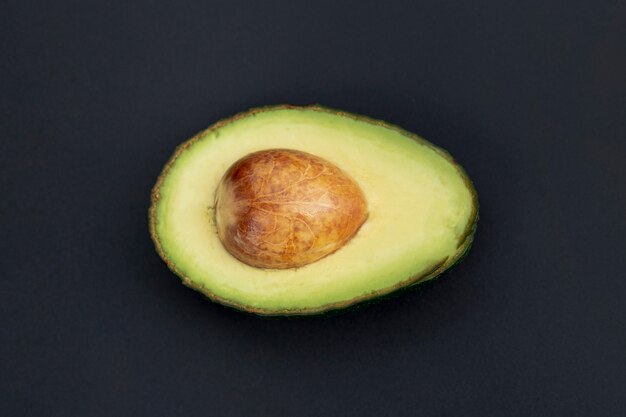 Top view of avocado half with pit