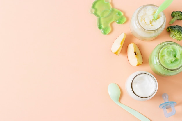 Top view baby food on pink background