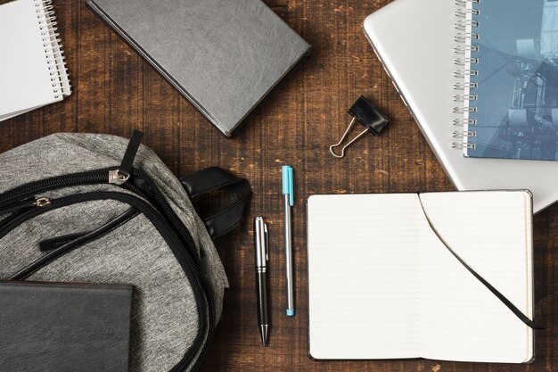 Top view backpack full of stationery items