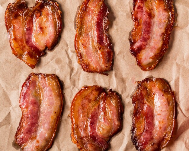 Top view bacon slices on paper