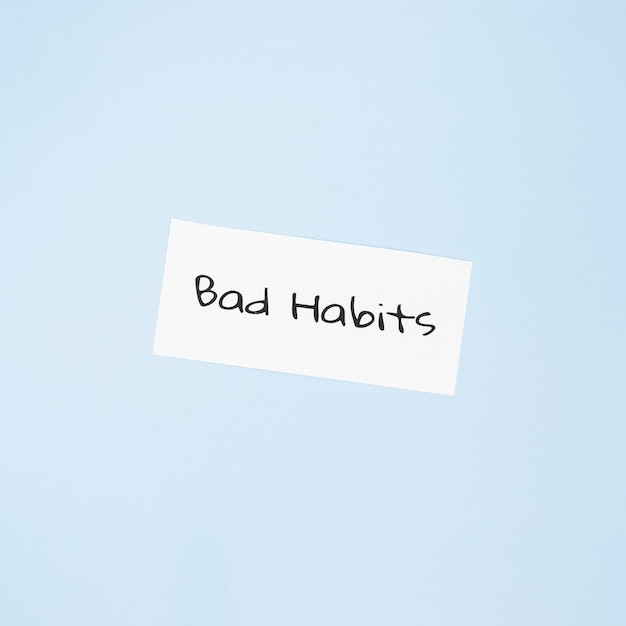 Top view of bad habit concept with copy space