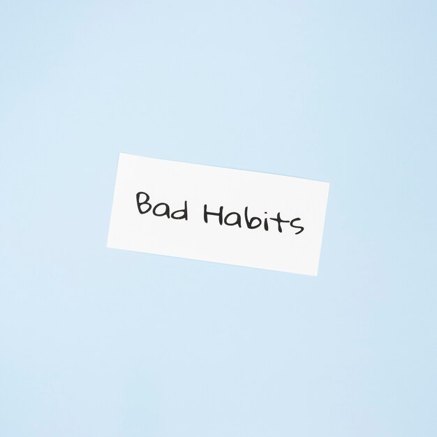 Top view of bad habit concept with copy space