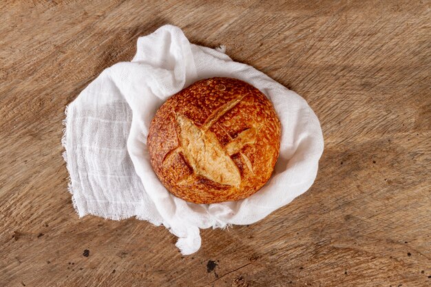 Top view baked bread on cloth