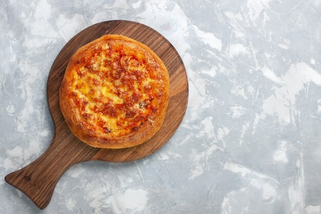 Top view baked pizza with cheese on light-white