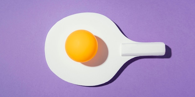 Top view ball on ping pong paddle