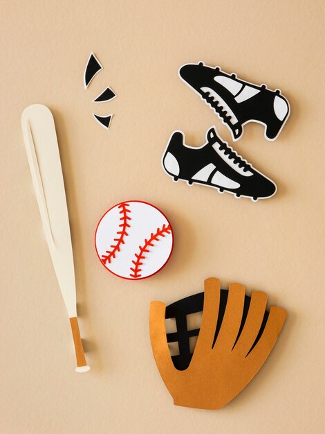 Top view of baseball bat with sneakers and glove