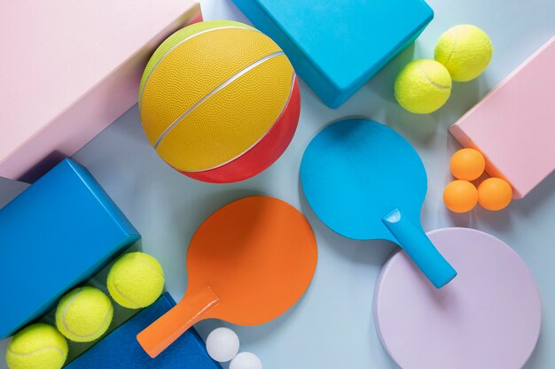 Top view of basketball with ping pong and tennis balls