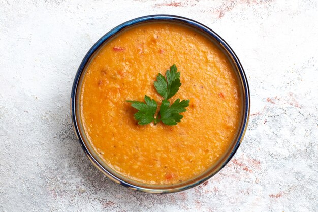 Top view bean soup called merci inside plate on white surface soup meal food vegetable bean