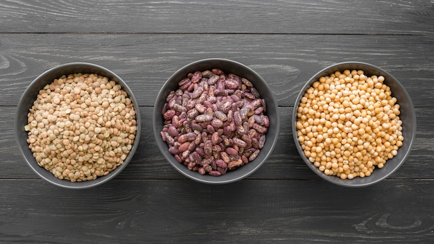 Top view of beans arrangement on wooden table