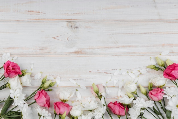 Top view beautiful spring flowers composition with copy space