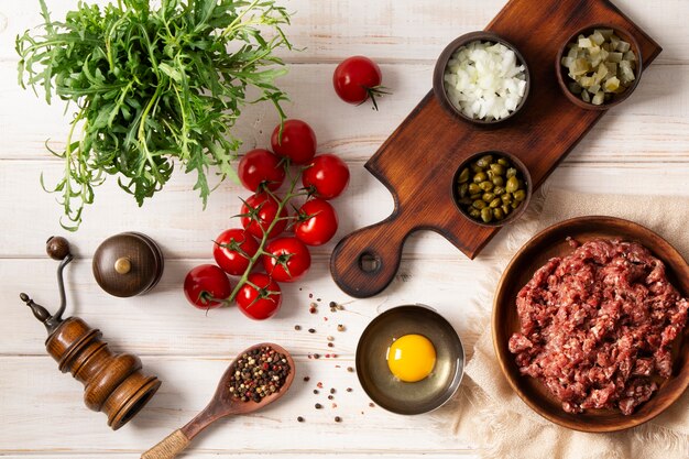 Top view beef steak tartar still life