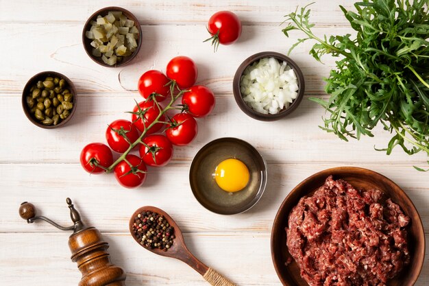 Top view beef steak tartar still life