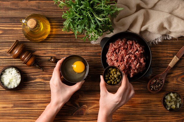 Top view beef steak tartar still life