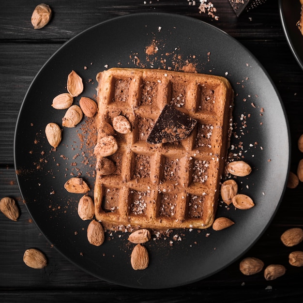 Top view belgian waffle with almonds