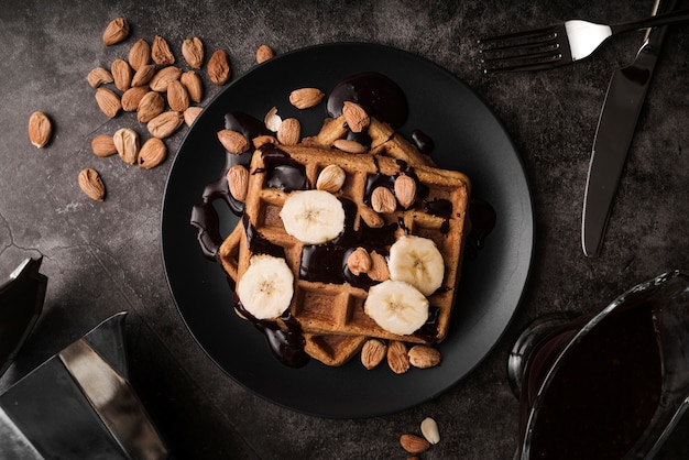 Top view belgian waffle with banana