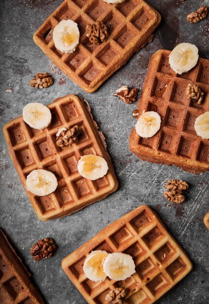 Top view belgian waffles with banana