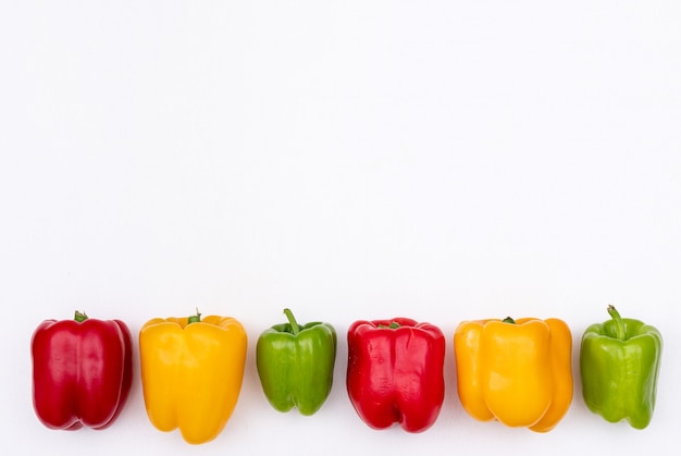 Top view bell pepper pepper with copy space on white  horizontal