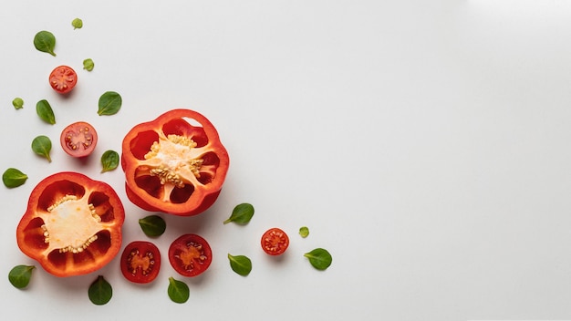 Top view of bell pepper with tomatoes and copy space