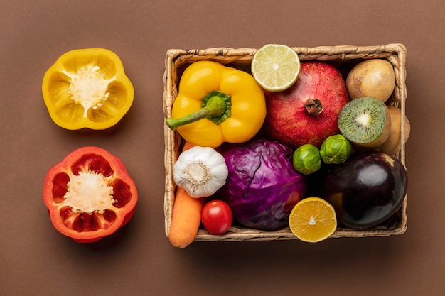 Top view of bell peppers with basket of vegetables