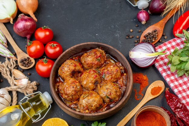 Top view big meatball soup in bowl red pepper powder