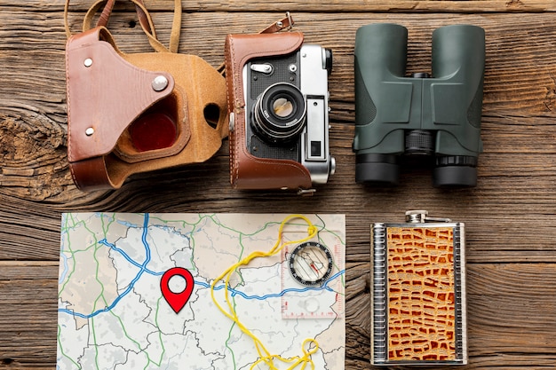 Top view binoculars with camera and a map