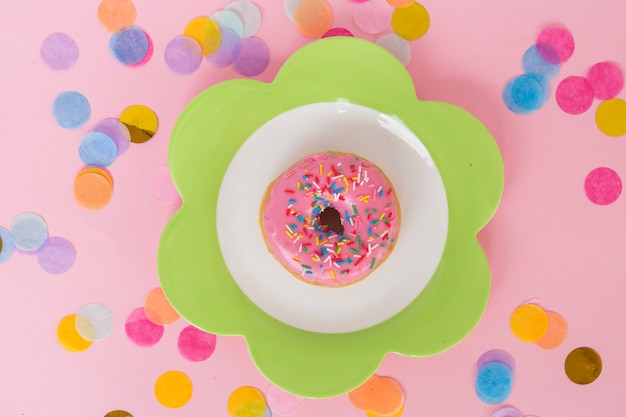 Top view birthday donut with confetti