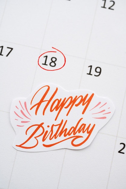 Free photo top view of birthday memo added in vibrant calendar