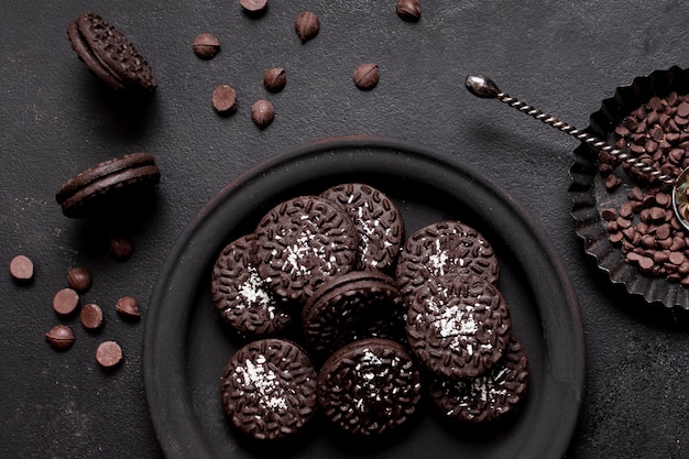 Top view biscuits on plate and arrangement of chocolate chips