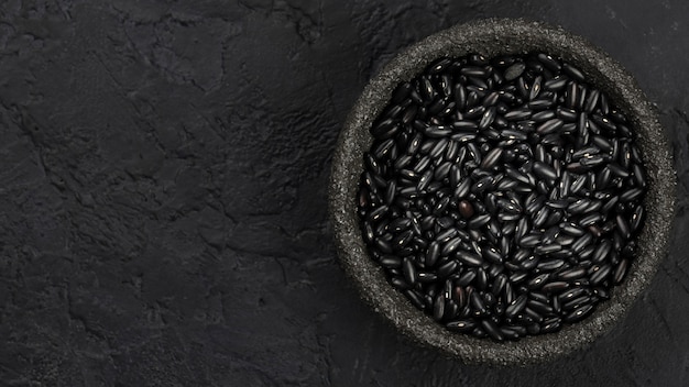 Top view of black beans in bowl with copy space