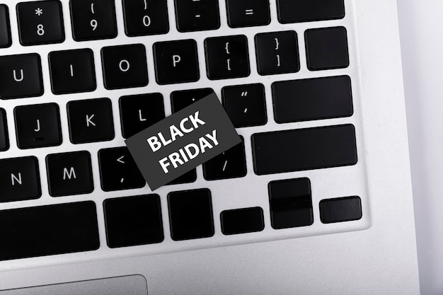 Top view black friday sticker on keyboard