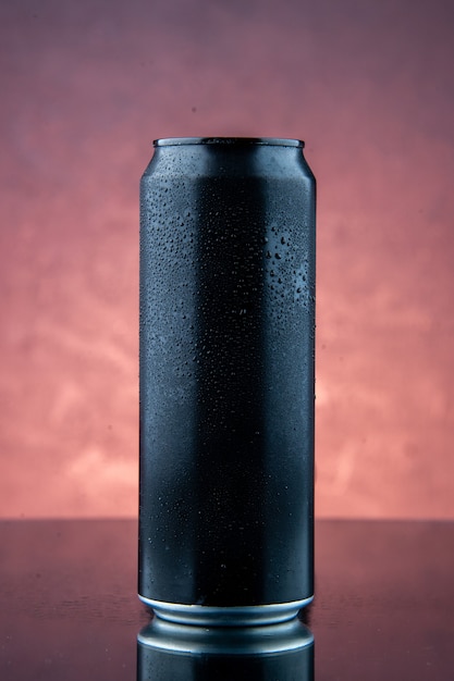 Free photo top view of black iron bottle standing on dark background