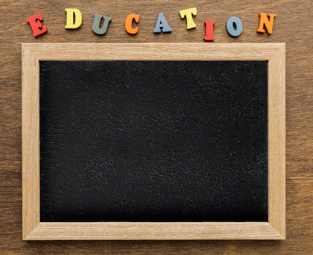 Top view of blackboard with letters