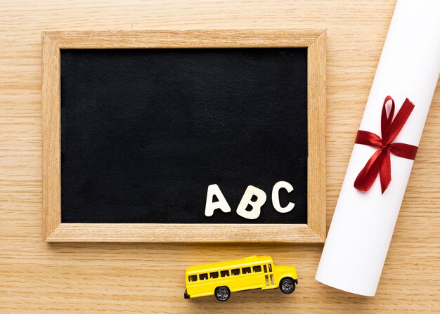 Top view of blackboard with school bus