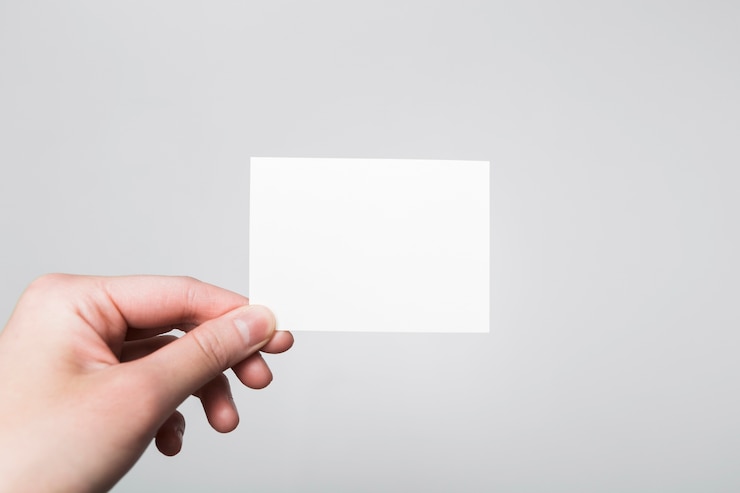Free Photo top view blank business card concept