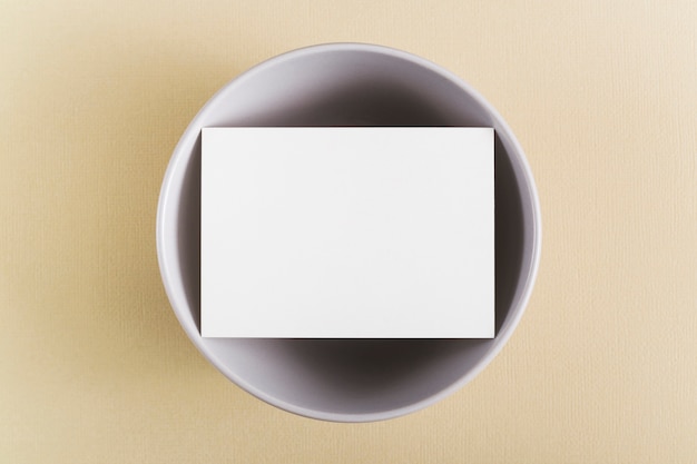 Top view blank business card on a plate