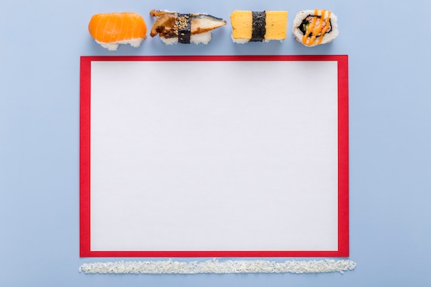 Top view of blank menu paper with sushi and rice
