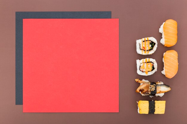 Top view of blank menu paper with sushi