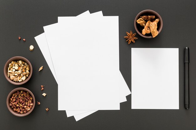 Top view of blank menu papers with star anise