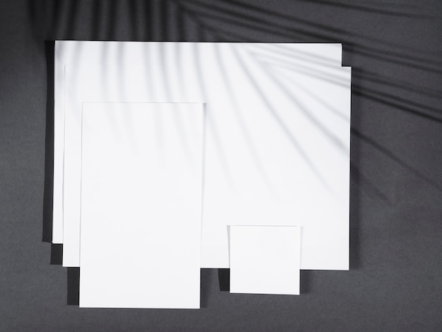 Top view blank papers with shadows