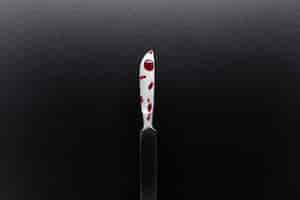 Free photo top view of bloody medical scalpel