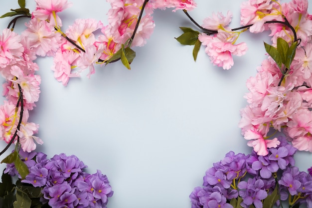 Top view blooming flowers frame