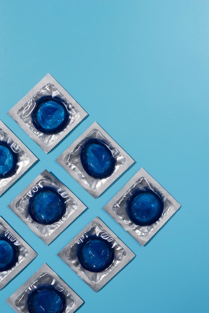 Top view blue condoms arrangement