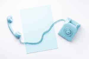 Free photo top view blue monday concept composition with telephone