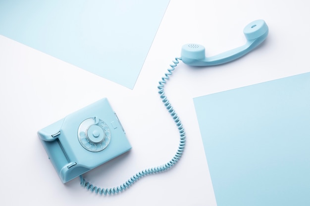 Free photo top view blue monday concept composition with telephone