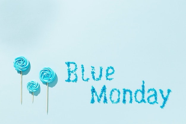 Free photo top view blue monday lettering composition