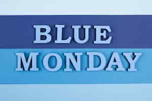 Free photo top view of blue monday paper