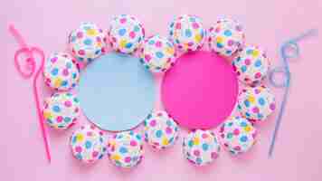 Free photo top view blue and pink party decorations