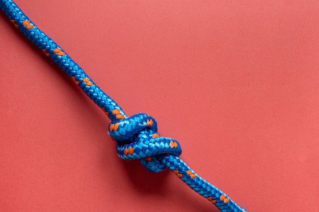 Top view blue rope with knot copy space