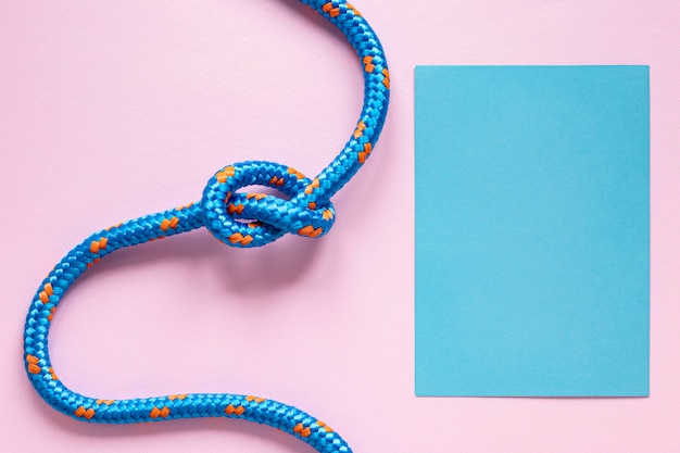 Top view blue rope with knot copy space